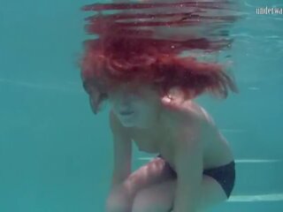 Inviting Underwater Redhead Nikita Vodorezova