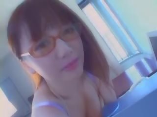 Asian chick with glasses fucks in a work place